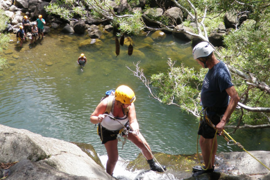 Rappelling down Waterfalls Garden of Eden, Maui Hawaii