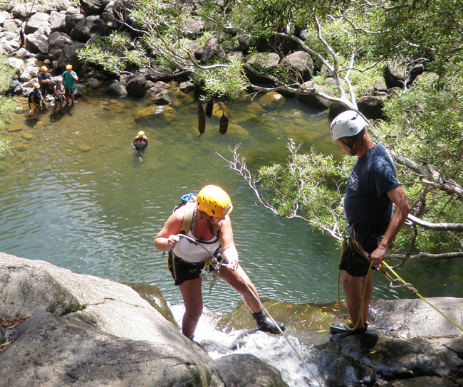 Rappelling down Waterfalls Garden of Eden, Maui Hawaii